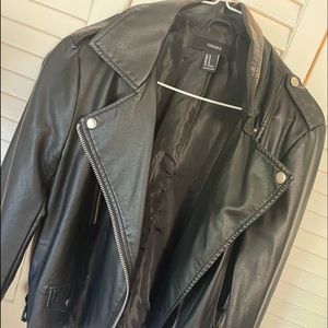 Black Faux leather jacket. Good condition.